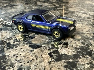 Neu Hot Wheels 2025 The Hot Ones '70 Toyota Celica Custom Schlüsselanhänger Neu lose - Bild 1 von 6