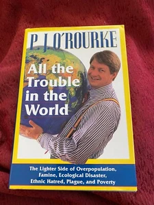 P J 'OROURKE ALL THE TROUBLE IN THE WORLD HARDCOVER 1ST PRT SIGNED - Picture 1 of 7