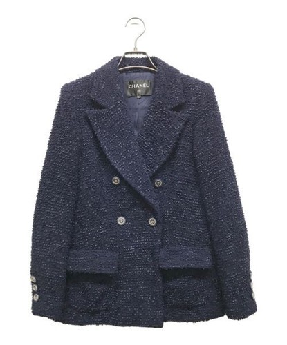 CHANEL Giacca in tweed con bottoni perlati Coco Mark