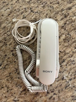 Teléfono Sony IT-B5 de colección con cable fijo beige montaje en pared o escritorio Foto 1 de 4