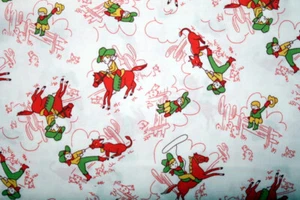 STORYBOOK COWBOY KID ROPING AND RIDING IN RED AND GREEN - 100% COTTON FABRIC - Picture 1 of 3