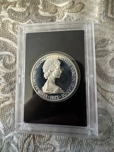 Plata 1973 $1 dólar Islas Vírgenes Británicas gema prueba fragata pájaro - Imagen 1 de 3