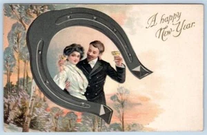 1910er GLÜCKLICHES NEUES JAHR PAAR HUFEISEN TOASTING FRÜHE KURT TEICH POSTKARTE - Bild 1 von 2