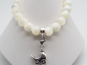 Handmade mother of pearl & 925 stretchy charm bracelet - Picture 1 of 7