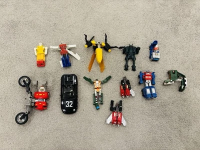 Tonka Gobots Lot of 12 Transforming Robot Mixed Figures Porsche Cy Kill - Image 1 of 4