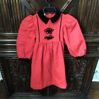 Girl's party dress red with black accents. Size 6. Pre-owned