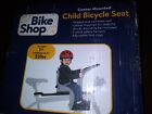 Bike Shop Child Bicycle Seat Center Mount  new in Box. Wit adjustable foot cups.