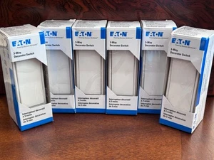 Interruptor decorador de 3 vías Eaton 7623W-BX-LW - Blanco - 15A 120V - 6 interruptores - Imagen 1 de 2