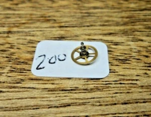 NOS Vacheron Constantin 458-457 OEM Uhr Teil: 205 MITTELRAD & KANONENRITZEL - Bild 1 von 1