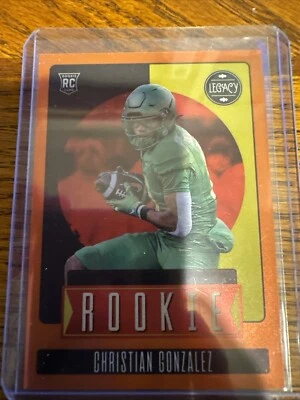 2023 Legacy Rookies Orange Premium Edition # 38 Of 149 Christian Gonzalez (RC) - Image 1 of 3