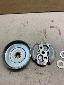 Clutch assembly from a Wizard Model 214 chainsaw, 38cc engine. - Picture 1 of 3