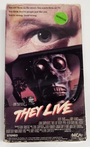 THEY LIVE John Carpenter's 1989 VHS Horror Classic Aliens Movie MCA Roddy Pipper - Imagen 1 de 8