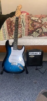 Guitarra eléctrica para principiantes Segawe OFW-Y01-1206A-2 con amplificador Foto 1 de 4