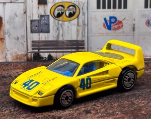 Ferrari F40 25 aniversario Hot Wheels con Ultra Hots (amarillo) como nuevo/suelto - Imagen 1 de 6