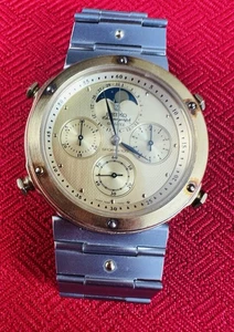 Reloj cronógrafo de cuarzo para hombre Seiko 7A48-7010 fase lunar esfera dorada y bisel - Imagen 1 de 11