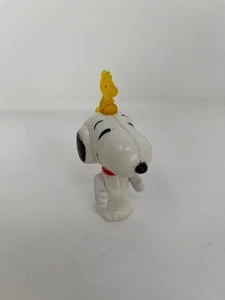 Peanuts Snoopy mit beweglichen Armen mit Woodstock sitzend auf dem Kopf Figur - Bild 1 von 4