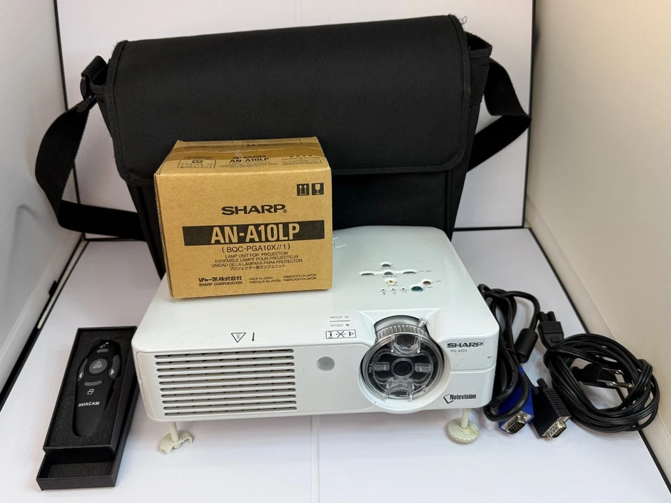 Sharp PG-A10X Projector, Cables, Clicker, Extra Lamp, and case - Image 1 of 3