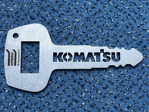 Flaschenöffner Komatsu Edelstahl Kapselheber Bieröffner Bierflaschenöffner - Bild 1 von 1