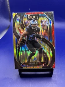 2024 Panini Select - Premier Level Jahmyr Gibbs #163 Yellow & Red Shock Prizm - Imagen 1 de 1