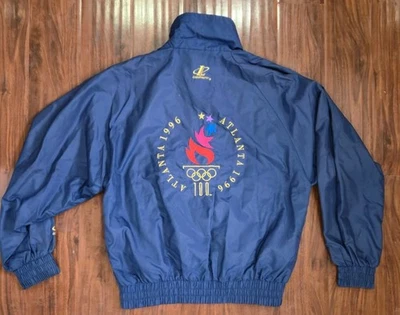 Chaqueta atlética vintage 1996 con logotipo de los Juegos Olímpicos de Atlanta azul marino mediana  Foto 1 de 4