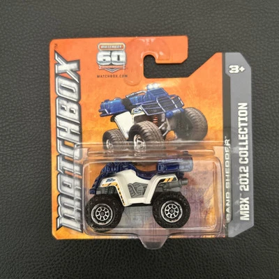 MATCHBOX SAND SHEDDER MBX 2012 COLLECTION SHORT CARD WHITE AND BLUE - Image 1 of 2