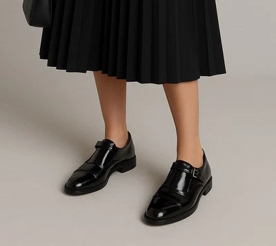 Mocasines Tod’s Monkstrap IT38 de charol negro para mujer Foto 1 de 4