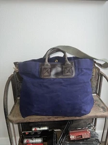 BOLSO DE MANO GRANDE UNITED AZUL LONA/CUERO DESGASTADO - Imagen 1 de 8
