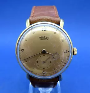 OROLOGIO DA POLSO VINTAGE - CARICA MANUALE - MEDANA 17 JEWELS / FUNZIONANTE - Foto 1 di 10