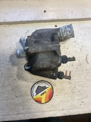 Toyota Land Cruiser FJ60 1985 2f motor refrigerante termostato carcasa Foto 1 de 4