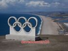 PHOTO  PORTLAND: OLYMPIC RINGS AND CHESIL BEACH VIEW THIS FAMOUS SPECTACULAR VIE