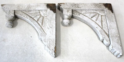 PAR de ménsulas de madera antiguas con remate y sol con rayos Foto 1 de 4