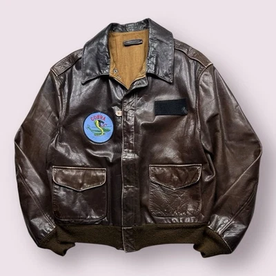 Винтажная мужская коричневая кожаная куртка-бомбер A-2 нашивка Cobra 70-е Scovill США на молнии - Изображение 1 из 4