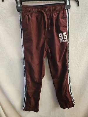 Pantalones elásticos deportivos con cordón rojo borgoña Oshkosh B'Gosh para niños 7 con bolsillos Foto 1 de 4