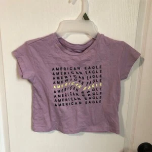 Camiseta Gráfica American Eagle Niños Púrpura Talla 4 Manga Corta Cuello Redondo Nueva con Etiquetas - Imagen 1 de 8