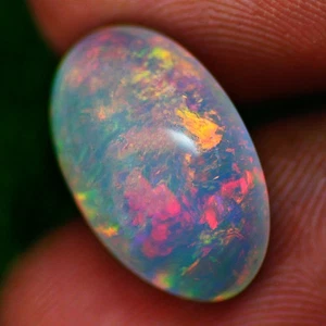 5.670Ct Oval 17.55 x 11.24 x 6.96 MM Multi Colors Dancing Rainbow Fire Opal - Picture 1 of 5