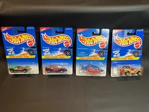 Hot Wheels Street Eaters serie set completo di 4 auto 1996 412 413 414 415 - Foto 1 di 22
