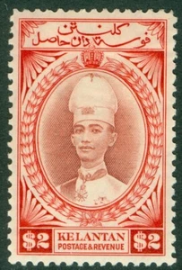 SG 53 Kelantan 1937-40. 2€ rosso-marrone e scarlatto. Un bel nuovo montato... - Foto 1 di 2