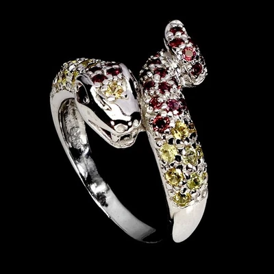 Anillo redondo de plata de ley 925 con rubí, rodolita, zafiro y cobra... Foto 1 de 4