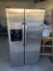 Frigidaire refrigerator Stainless steel ..side by side photo