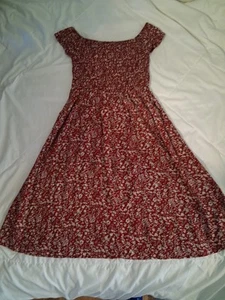 Sarah Louise Tween smocked red floral dress. Below the knee - Picture 1 of 10