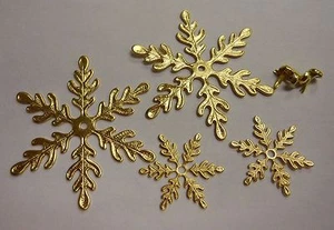 Adorno de copo de nieve dorado para fabricación de tarjetas y álbum de recortes - Imagen 1 de 1