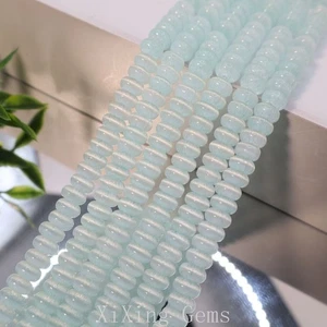 Cuentas espaciadoras rondelle ópalo ojo de gato aguamarina de alta calidad de 3x6 mm para hacer joyas - Imagen 1 de 6