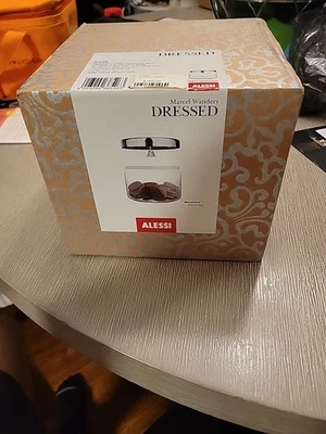 Tarro de galletas "vestido" en tapa de vidrio en espejo de acero inoxidable 18/10 pulido con... Foto 1 de 2