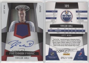 2010-11 Certified Freshman Fabric Mirror Red /100 Taylor Hall #189 Rookie RC
