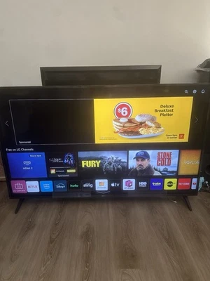 LG UN 65 Inch 4K Smart UHD TV webOS Comes with Remote Control and Power Cord - Image 1 of 4