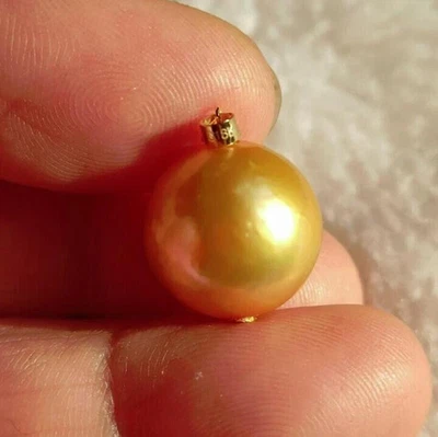 Colgante redondo de perlas de oro amarillo de 18k AAA 13-12mm real natural del mar del sur Foto 1 de 4