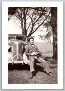 1940s WWII Soldier Sitting On Bumper Car Automobile Original Photograph - Picture 1 of 2