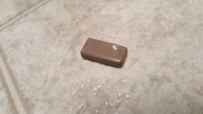 1998-2002 TOYOTA corolla door lock knob bone brown 6974104010E1 OEM a223 - Image 1 of 3