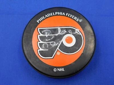Disco Philadelphia Flyers firmado por Bob Clarke de la NHL con certificado de autenticidad Foto 1 de 2