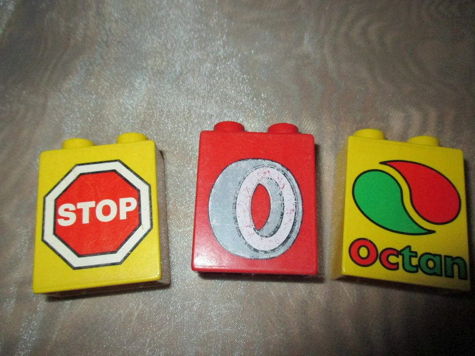 3 Lego Duplo Motivsteine Octan Reifen Stop Bausteine 1x2x2 mit Aufdruck  - Bild 1 von 1